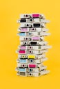 Ink cartridges exhausted stacked on yellow background