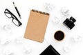 Ink, dip pen, notebook, coffee, glasses for writer workplace set on white office background top view mock-up Royalty Free Stock Photo