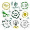 Ink logotypes set. Badges, labels,leaves,ribbons,plants elements, laurel.