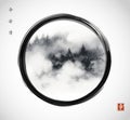 Ink painting of landscape with forest trees in fog in black enso zen circle. Oriental ink painting sumi-e, u-sin, go-hua. Royalty Free Stock Photo