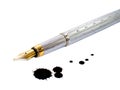 Ink-pen and ink blot Royalty Free Stock Photo