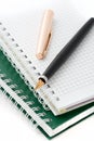 The ink pen and notebook Royalty Free Stock Photo