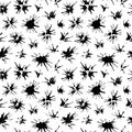 Ink splashes seamless pattern. Black artistic spots, splashes, blots on a white background. Royalty Free Stock Photo