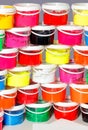 Ink in a variety of vibrant colors for printing in clear plastic containers stacked on top of each other