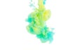 Ink. Yellow, blue, and green acrylic colors. Ink swirling in water. Color explosion Royalty Free Stock Photo