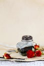 Inkwell, pen, dried roses, vintage letters and photographs Royalty Free Stock Photo