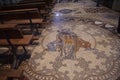 Inlaid marble floor with figure of saints