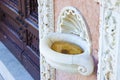 Inlaid marble holy water font in an Italian church Royalty Free Stock Photo