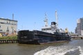 Inland freight ships on river Lek which transport seafreight to harbors in Germany and Switzerland Royalty Free Stock Photo