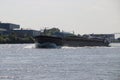 Inland freight ships on river Lek which transport seafreight to harbors in Germany and Switzerland