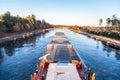 Inland vessel drives a canal Royalty Free Stock Photo
