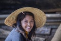 Portrait burmese girl a straw hat in local market. Inle lake, Myanmar, Burma