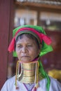 Padaung Tribal woman poses for a photo in Inle lake, Myanmar, Burma The Padaung-Karen long-necked tribe women are minority of