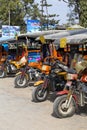 Auto rickshaw, three wheels motorcycle taxi on the street in Myanmar. This transport is cheap and popular in Burma.