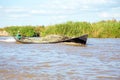 INLE LAKE, MYANMAR - November 23, 2015: Worker is transporting Royalty Free Stock Photo