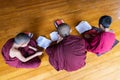 Inle, Myanmar - April 2019: Burmese monks studying in the monastery Royalty Free Stock Photo