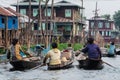 Inle, Myanmar - April 2019: Burmese women rowing boats in Mine Thauk village Royalty Free Stock Photo