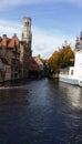 Brugge, Belgium in Autumn. Old town buildings on the canal Royalty Free Stock Photo