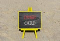 Inner child symbol. Concept words Inner child on beautiful black chalk blackboard. Beautiful sea sand beach background. Royalty Free Stock Photo