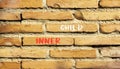 Inner child symbol. Concept words Inner child on beautiful brown bricks. Beautiful brick wall background. Beautiful brick wall. Royalty Free Stock Photo