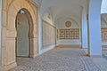 The inner courtyard with arcades of the archeological museum, with an exhibition of impressive roman mosaics