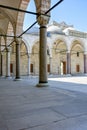 Inner courtyard and corridors with its arches and frescoes in the Blue Mosque