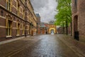 Inner courtyard and gateway Binnenhof Palace Hague Den Haag, The Netherlands. Dutch Parliament building Holland on a rainy day