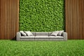 Inner courtyard with green vertical garden and sofa