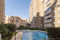 Inner courtyard of residential apartment buildings with swimmin Royalty Free Stock Photo