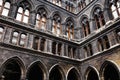 inner courtyard of the town hall with beautiful architecture, an old corridor with blackened columns Royalty Free Stock Photo