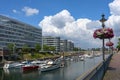 Inner harbor Duisburg, promenade at the marina with boats and modern office buildings on the Rhine in the city center, famous Royalty Free Stock Photo