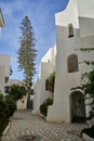 Inner lanes and paths of the glamorous holiday apartment complex of Port el Kantaoui with white holiday homes