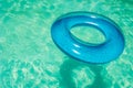 Inner tube in swimming pool. Royalty Free Stock Photo