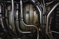 Inner workings of a jet engine with metal pipes and tubes Royalty Free Stock Photo