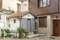 Inner yard of an old cosy house with little home church Royalty Free Stock Photo