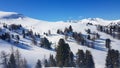 Innerkrems - A panoramic view on the snow covered ski runs of Innerkrems, Austria. The slopes are ready for skiing. Cloudless Royalty Free Stock Photo