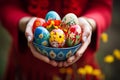 Innocence and joy childs hands holding easter basket with traditional bread and colorful eggs