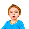 Innocent baby face isolated painted blue face expression newborn Royalty Free Stock Photo