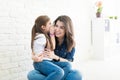Sharing Secret With Her Mom Royalty Free Stock Photo