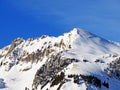 Innocently clear white snow on alpine peaks StÃÂ¶llen (Stoellen or Stollen) and Schofwisspitz Royalty Free Stock Photo