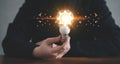 Innovation design concept. Hand holding light bulb for new idea brain storming creative inspiration Royalty Free Stock Photo