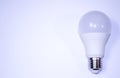 Innovation Light Bulb. Blue background Royalty Free Stock Photo