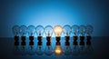 Innovation Standout: Single Illuminated Lightbulb Amidst Unlit Row for Leadership Concept