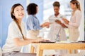 Innovation, success and a happy business woman working on a laptop in a corporate office, smiling about good news Royalty Free Stock Photo