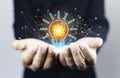 Innovation technology Concept. Hand Touching Icon Bulb. Concept with innovation inspiration. Success start from new ideas to Royalty Free Stock Photo