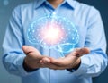 Innovation and Technology: A Glowing Brain in Hand Royalty Free Stock Photo