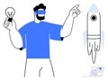 Man in Virtual Reality Headset Holding Lightbulb and Pointing at Rocket with Laptop Nearby Royalty Free Stock Photo