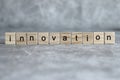 Innovation word written on wood cube