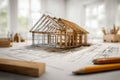 Innovative architectural design and 3d house model blending with technical blueprints on creative workspace with natural light and Royalty Free Stock Photo