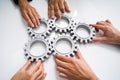 Innovative Businesspeople Team Hands Joining Gears Royalty Free Stock Photo